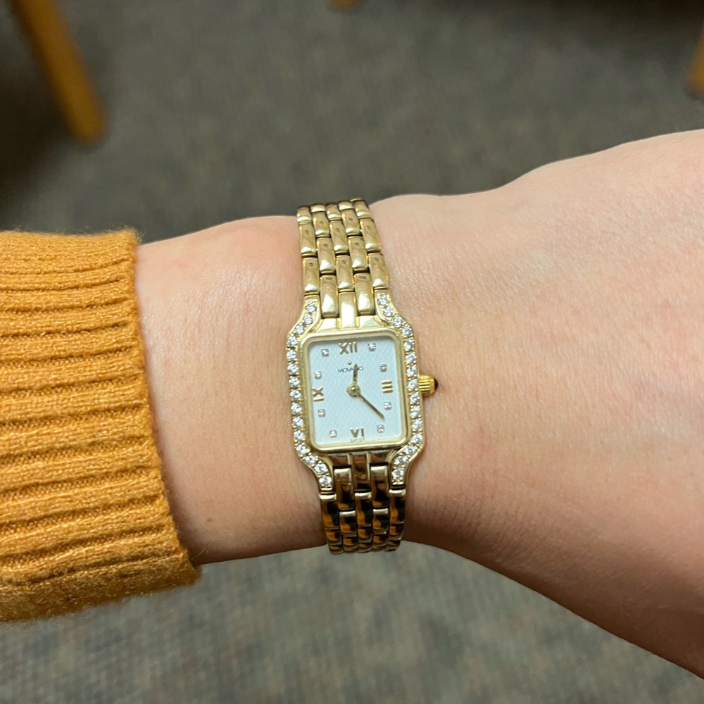 14k gold and diamond Movado tank watch